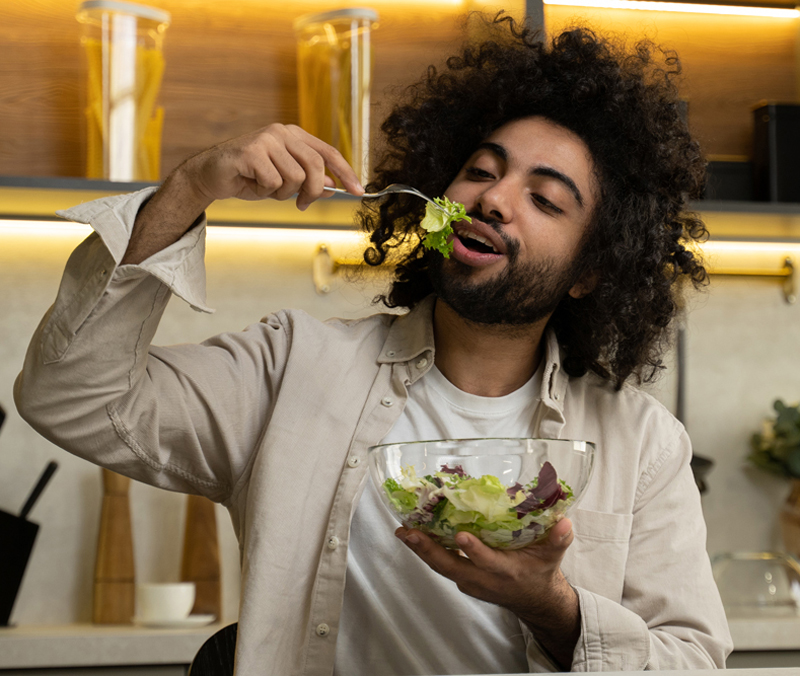 Egyptian Man enjoying parma on a salad